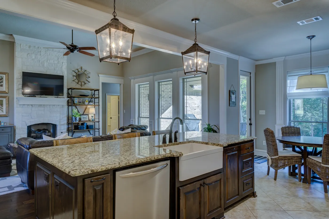A finished open-plan kitchen and living room with a large island